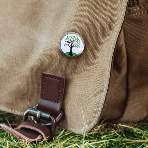 tree of life lapel pin on a canvas bag